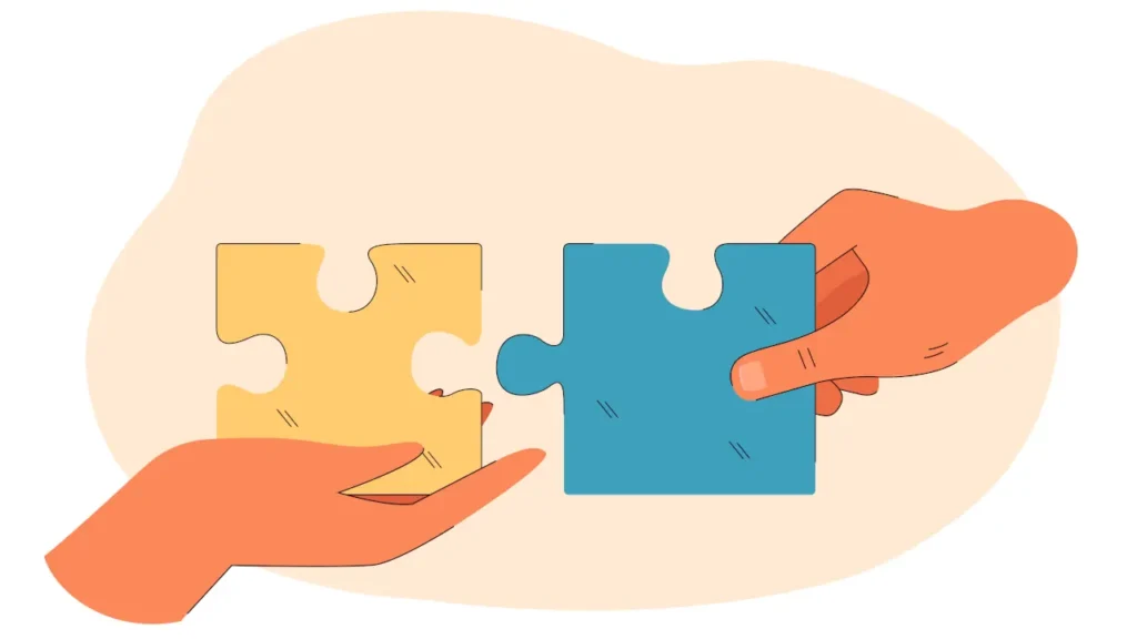 Desenho de duas mãos, cada uma segurando uma peça de quebra cabeça separadas